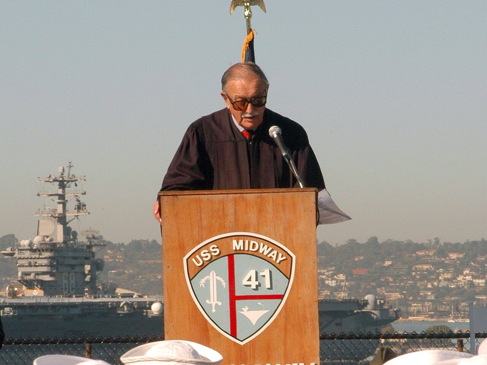 A federal judge addresses U.S. service members aboard the USS Midway in San Diego